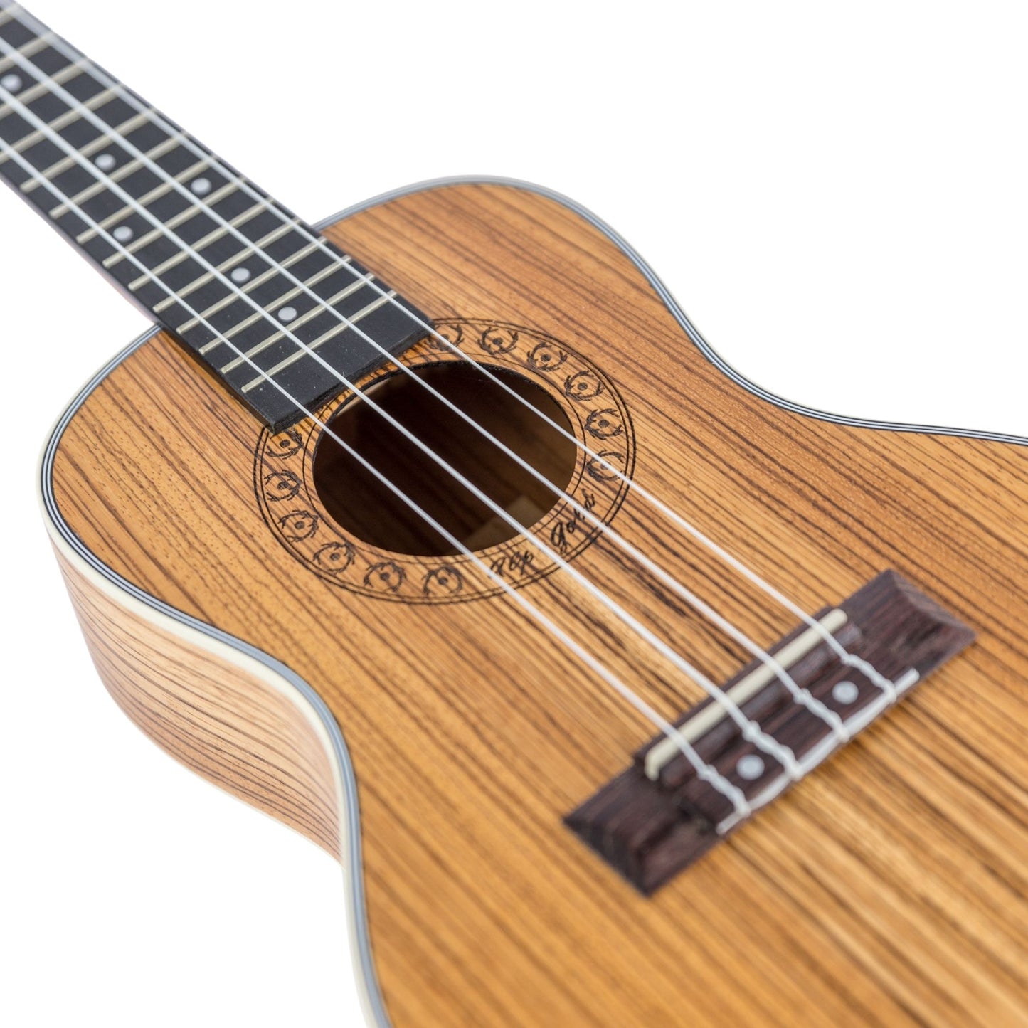 Nahaufnahme der Zebrano Ukulele mit Maßerholz-Decke und Griffbrett