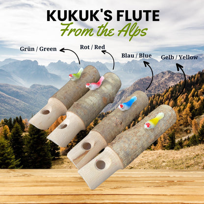 Handgefertigte Kuckuckspfeifen aus Südtirol vor Bergkulisse – Naturhandwerk