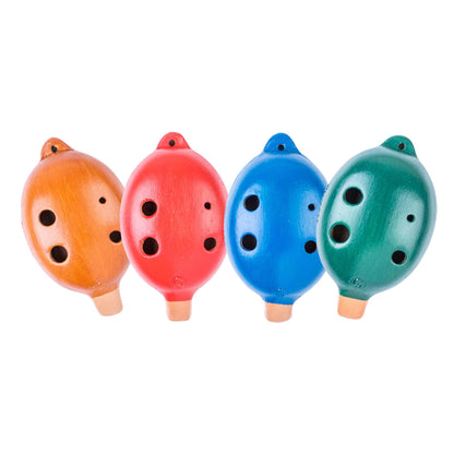 Das 4er Spar-Set der Plaschke Pendant Okarina: Alle vier Farben (Rot, Blau, Braun, Grün) auf weißem Hintergrund